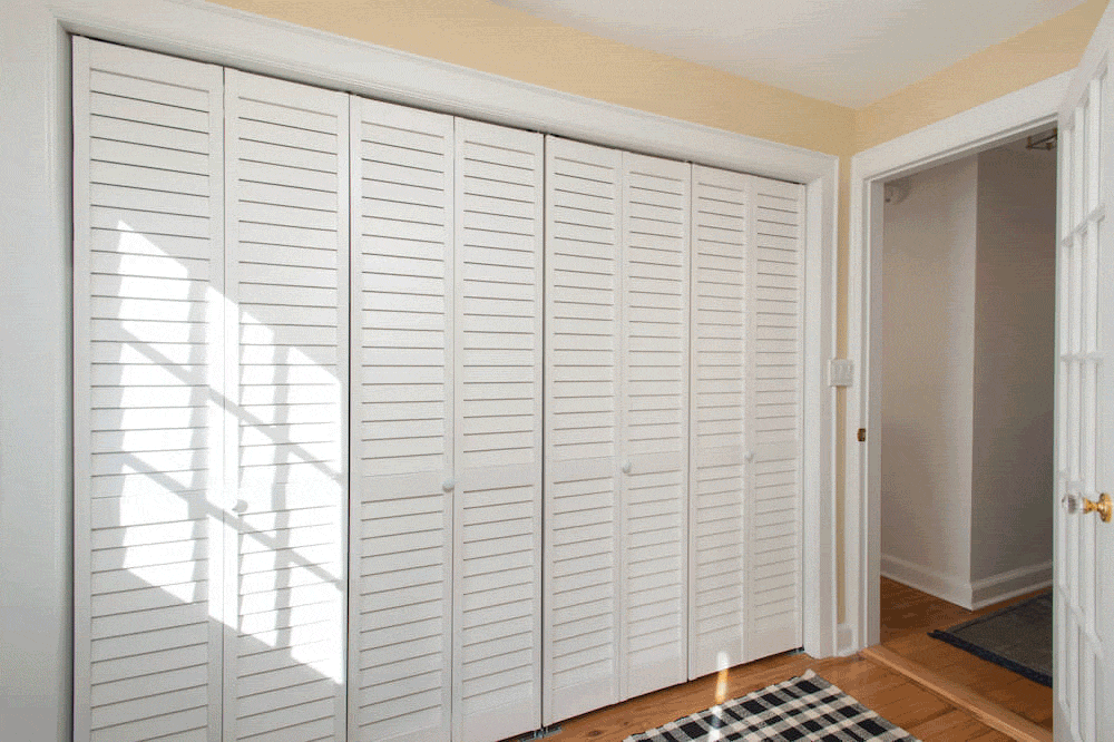 Laundry and mud room behind closet doors