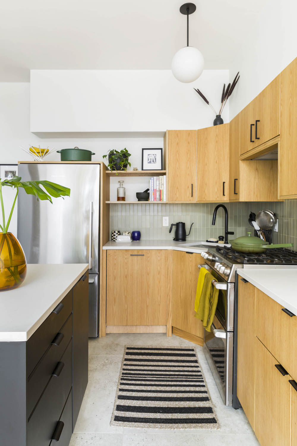 plywood kitchen with wood cabinets and stainless steel appliances